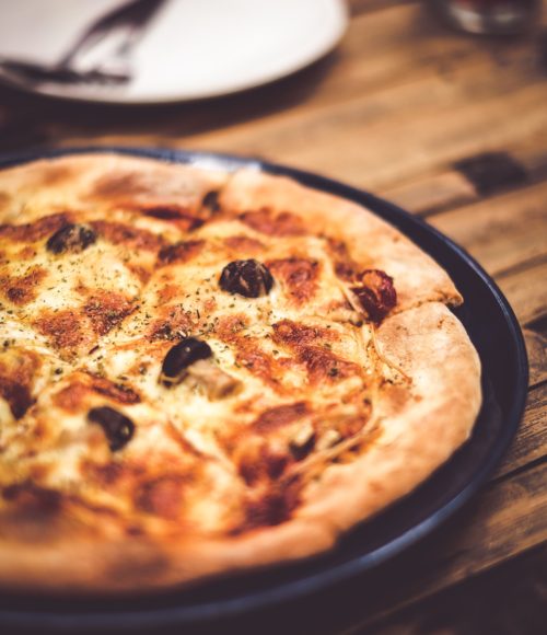 Laat de naam je niet foppen: eatmosfera pizza in Amsterdam Oost is super leuk en lekker